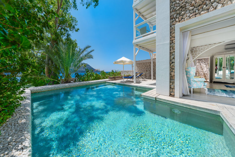 Likya Gardens Signature Pool Suite in Kalkan with a private wraparound swimming pool and panoramic sea views.