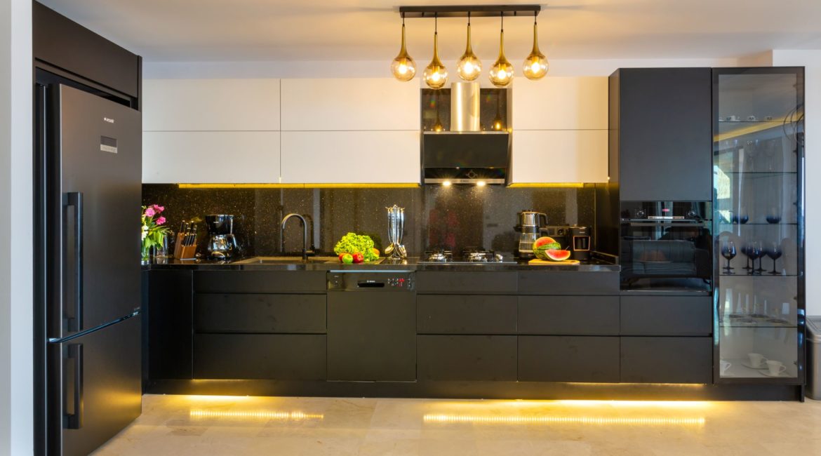 Waters Edge 1, Kalkan - A sleek black kitchen, modern and stylish design with high-end appliances