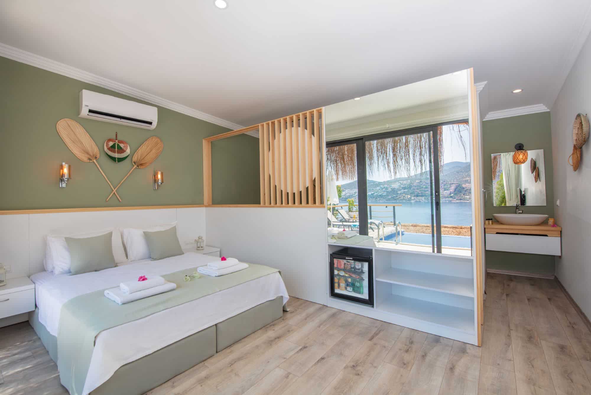 Tlos New Deluxe Pool Suite open plan suite