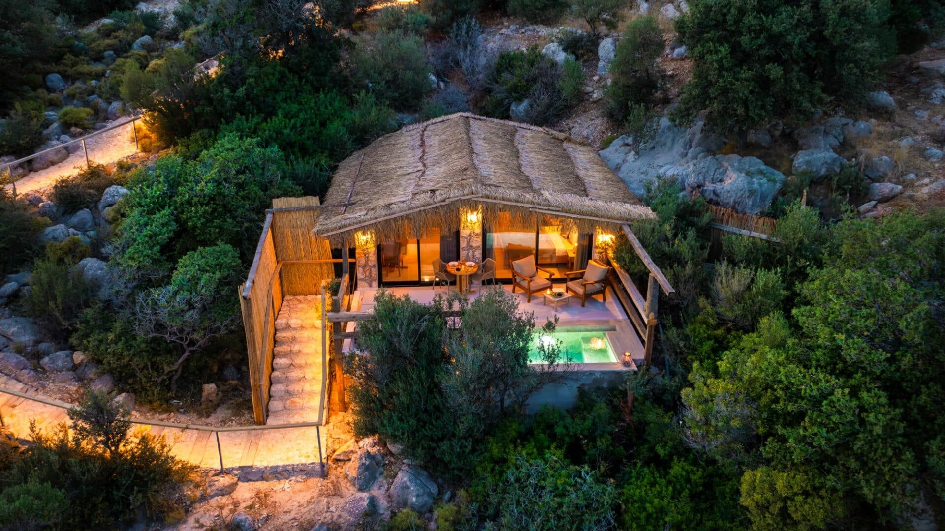 Waters Edge 6, Kalkan - A cosy villa at night, perched right at the water’s edge, offering breathtaking sea views, the ultimate escape where luxury meets the tranquil turquoise waters