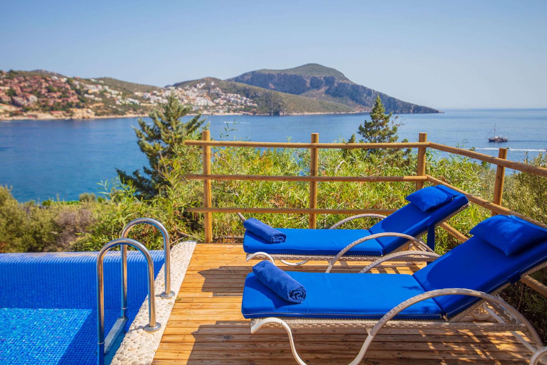 Daybeds at Likya Pavilion Loft Pool Suites in Kalkan with views of the private pool and the Mediterranean Sea