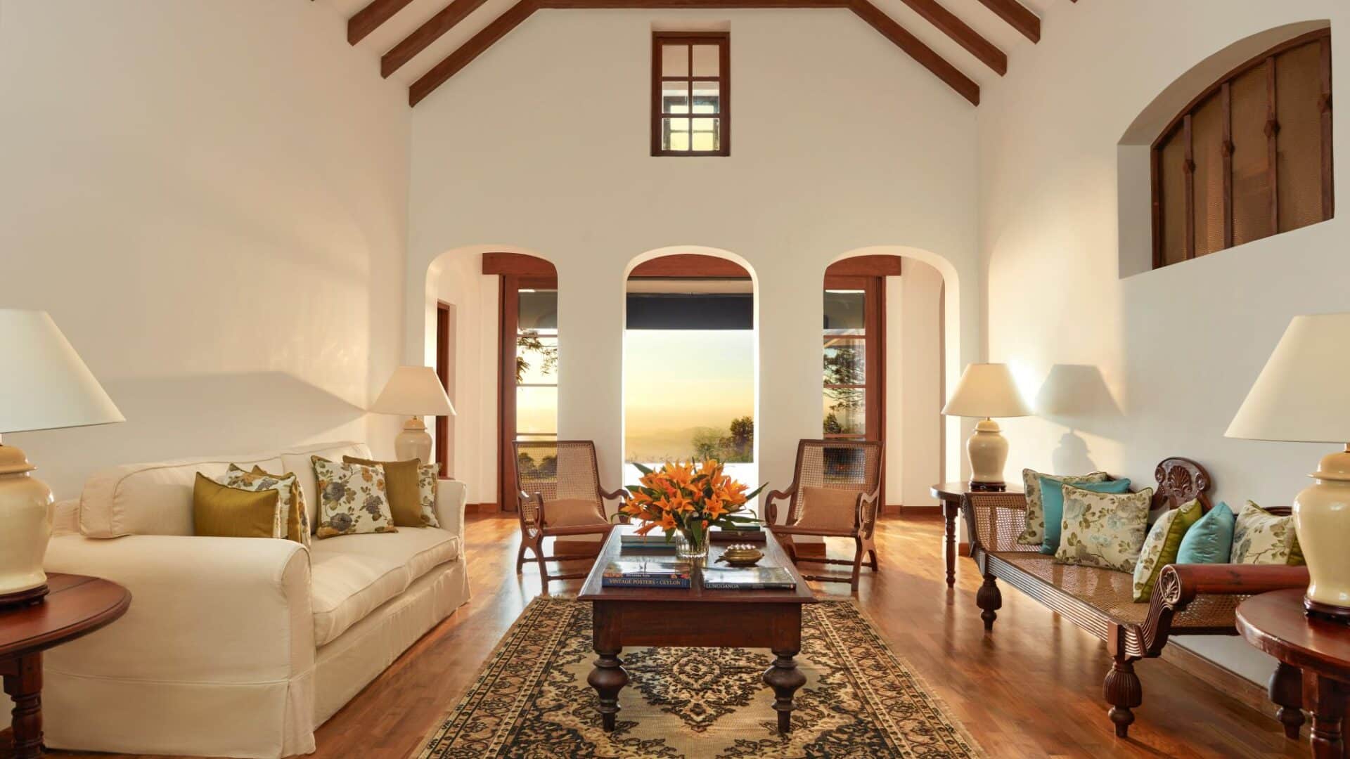 Elegant interior at Thotalagala with sunset views through open doors in Sri Lanka’s Hill Country