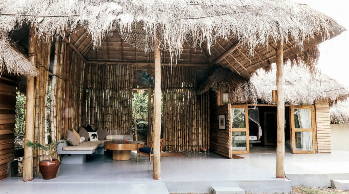 Gal Oya Lodge Family Suite exterior – Striking thatched design surrounded by wild greenery in Gal Oya National Park, Sri Lanka.