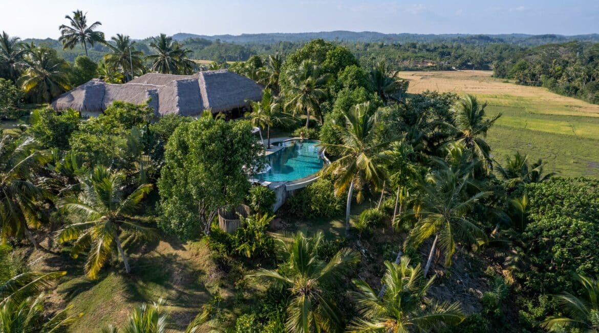 Tekanda Lodge by day aerial footage jungle and paddy setting