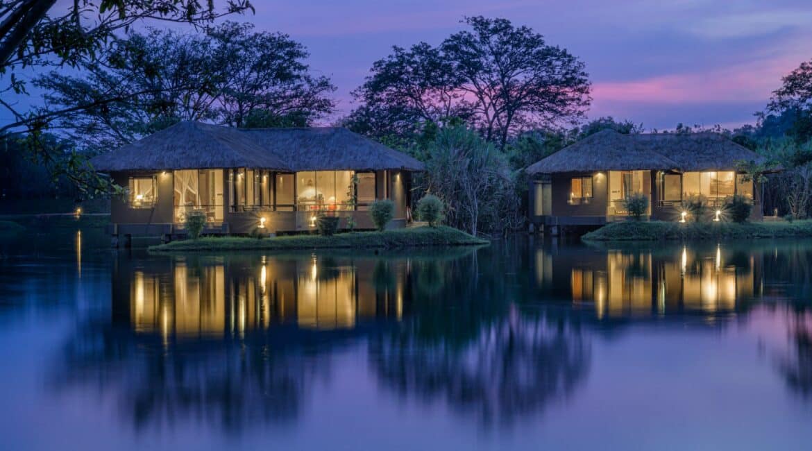 Elegant Water Garden Sigiriya suite at dusk with Sigiriya Rock in view, bathed in a purple twilight hue – luxury boutique hotel in Sri Lanka’s Cultural Triangle