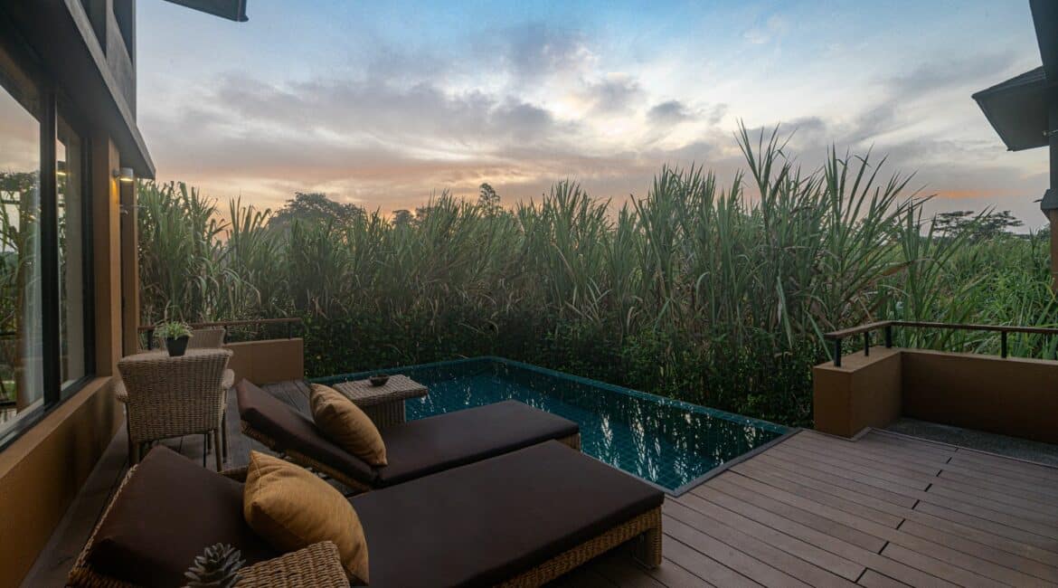 Water Garden Superior Deluxe Villas with Plunge Pool poolside at dusk