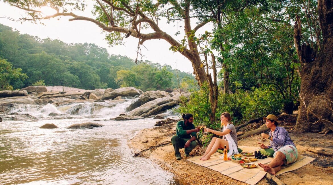 Gal Oya National Park scenic lake picnic setup with views across the water and surrounding wilderness