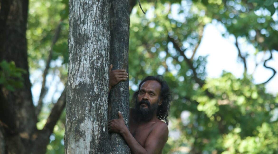 Vedda people of Gal Oya, Sri Lanka’s indigenous community, sharing traditions within the forest landscape.