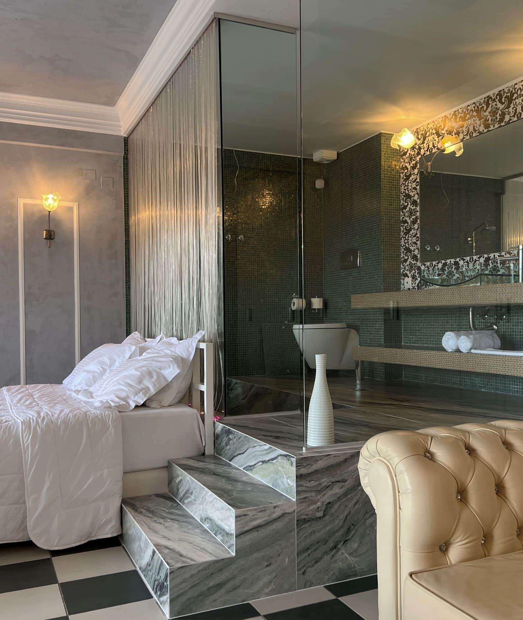 Irida Boutique Hotel Pebbles Superior Suite and raised bathroom