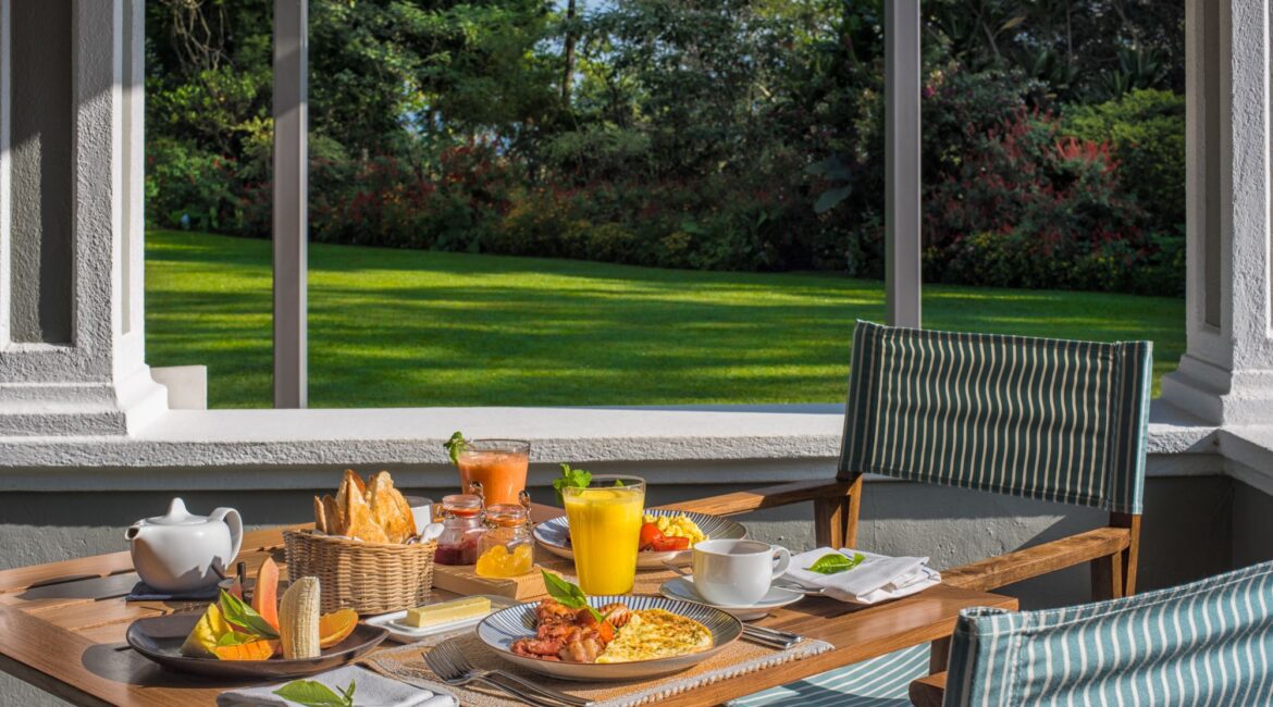 Breakfast served beside the manicured lawns at Nine Skies bungalow in Sri Lanka’s Hill Country