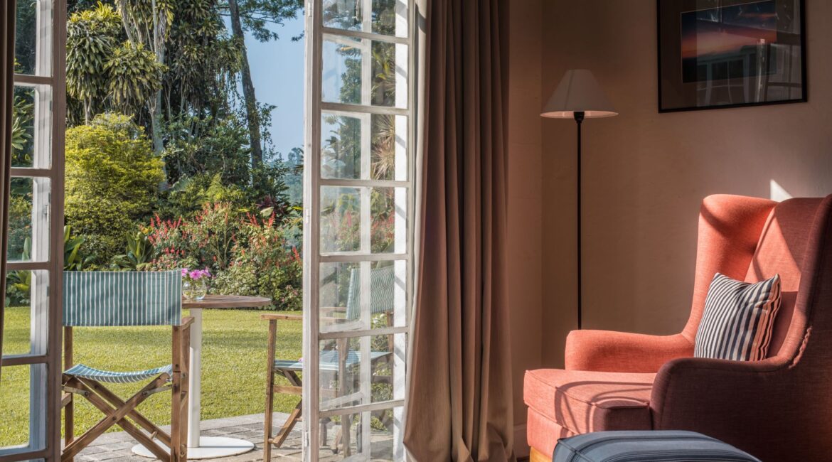 Nine Skies Badulla Demodera Bedroom beautiful sitting area and french doors open onto a furnished terrace