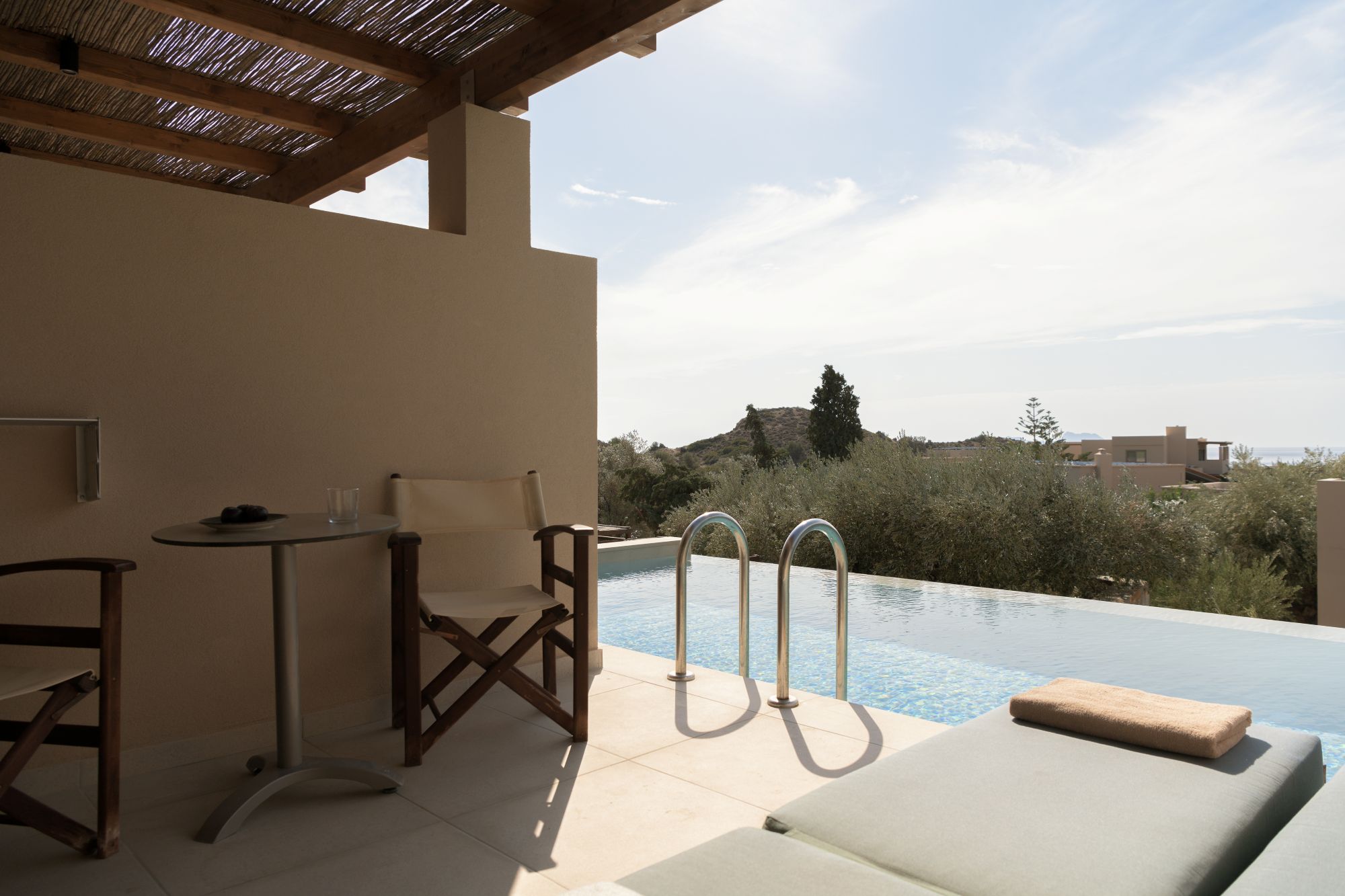 Paralos Irini Mare Junior Suite Mountain View Sharing Pool comfy day beds and manicured terraces