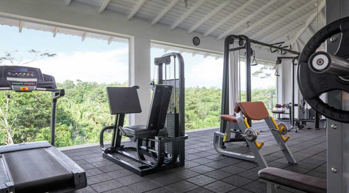 Kahanda Kanda gym with modern equipment and jungle views