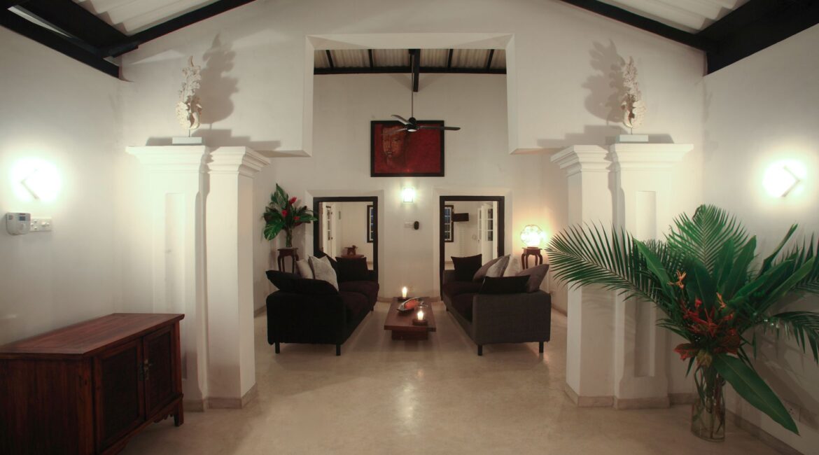 Coco Tangalla Hotel near Tangalle, Sri Lanka – inviting common sitting area with plush sofas, eclectic décor, and a relaxed, homely atmosphere.