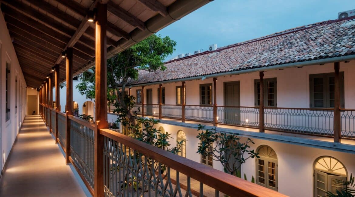 Inward-looking rooms at Fort Bazaar Hotel Sri Lanka with windows facing the central courtyard, featuring elegant furnishings and a serene atmosphere.