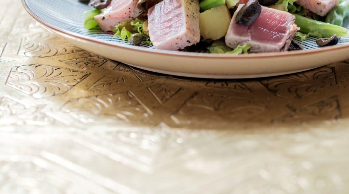 Delicious seared tuna steak salad at Fort Bazaar Hotel Sri Lanka, featuring slices of rare tuna on a bed of fresh greens and colourful vegetables.