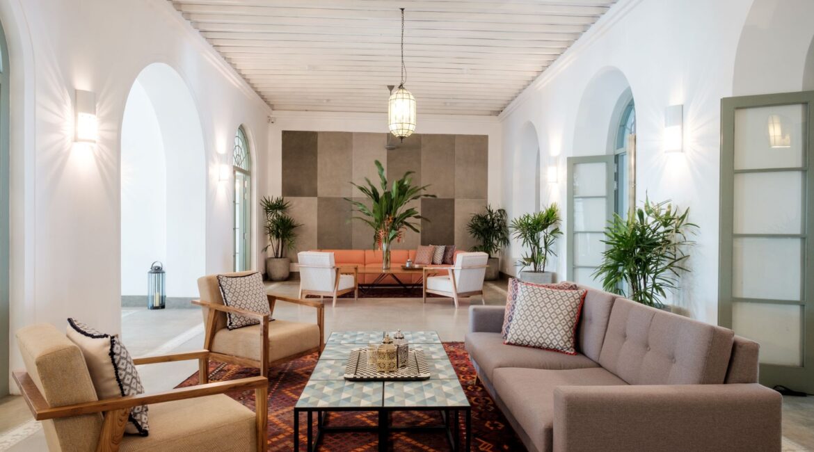 Comfy and stylish lobby entrance at Fort Bazaar Hotel Sri Lanka featuring elegant seating, warm lighting, and welcoming décor.