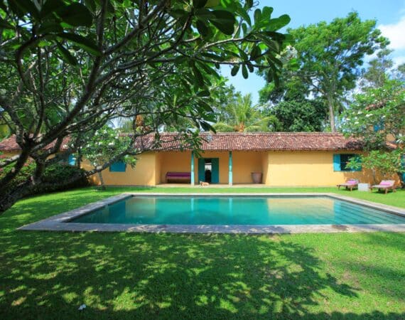 The Last House Tangalle Sri Lanka sun dappled lawns and swimming pool