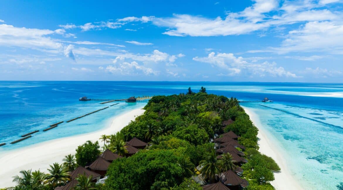 Komandoo Island Resort & Spa the resort bursting with vegetation fringed by sand