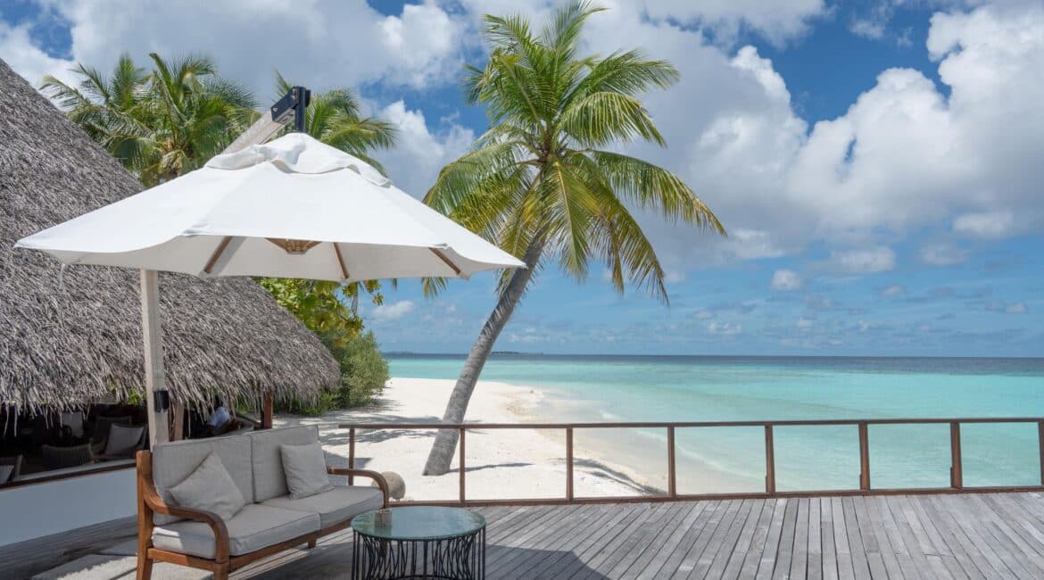 Makunudu Island Maldives furnished decks adjacent to the sand with comfy corners for quiet contemplation or a well deserved beer