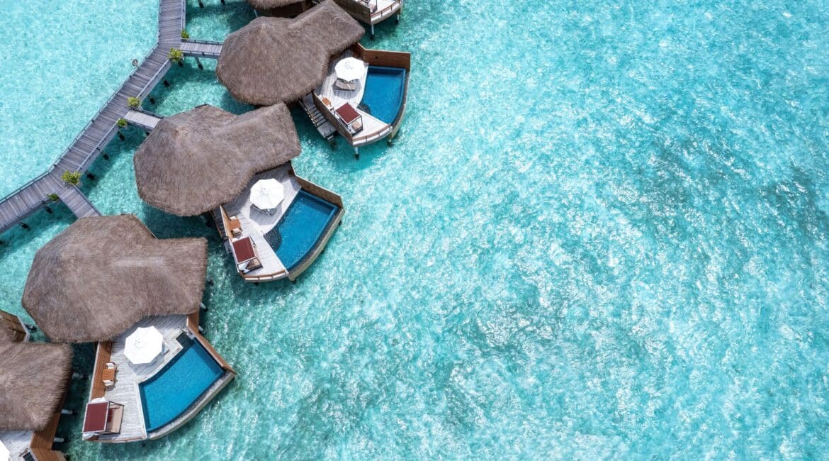 Baros stunning Indian Ocean crystal clear water and pool villas hanging over the Indian Ocean Maldives
