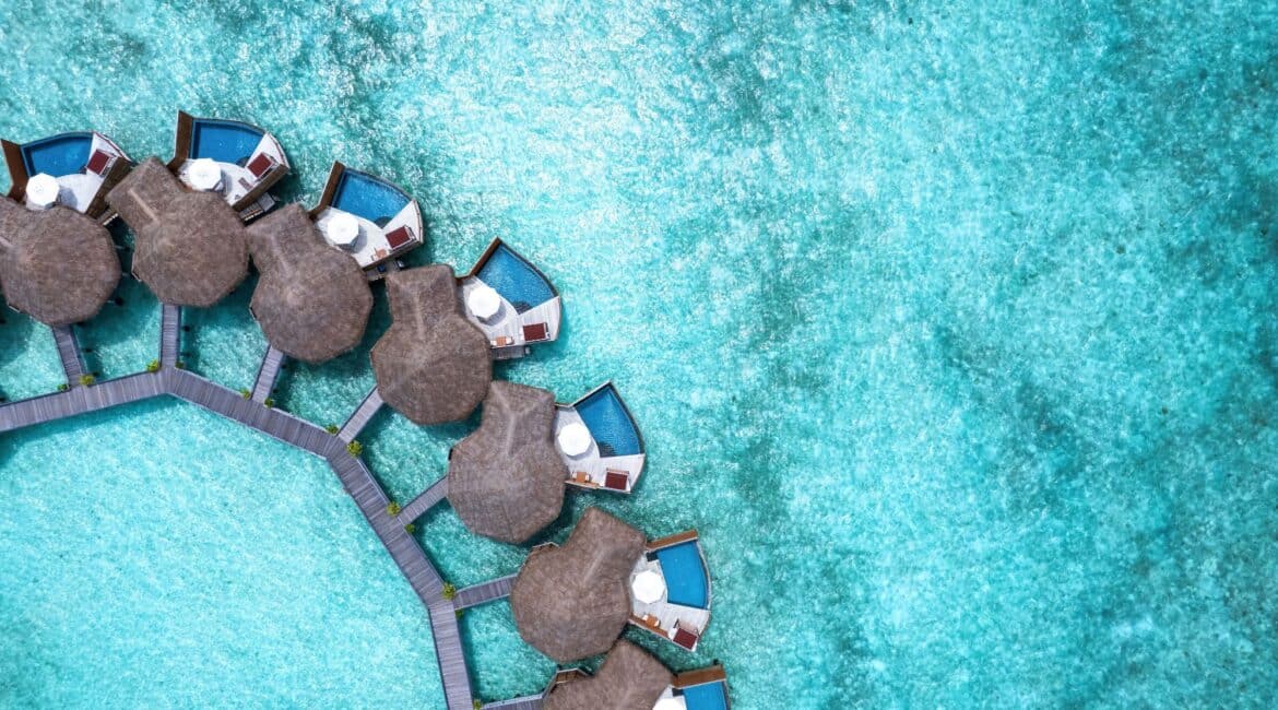 Baros crystal clear turquoise waters and pool villas hovering over the Indian Ocean Maldives