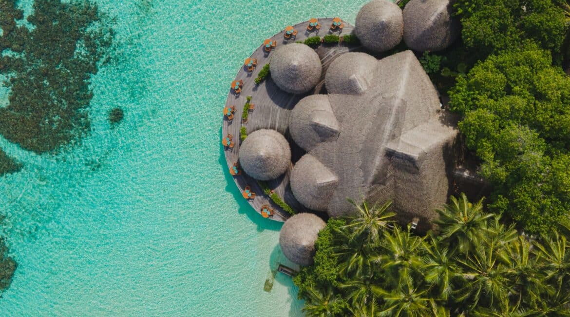 Baros dining pavilion over the stunning turquoise seas of the Indian Ocean Maldives