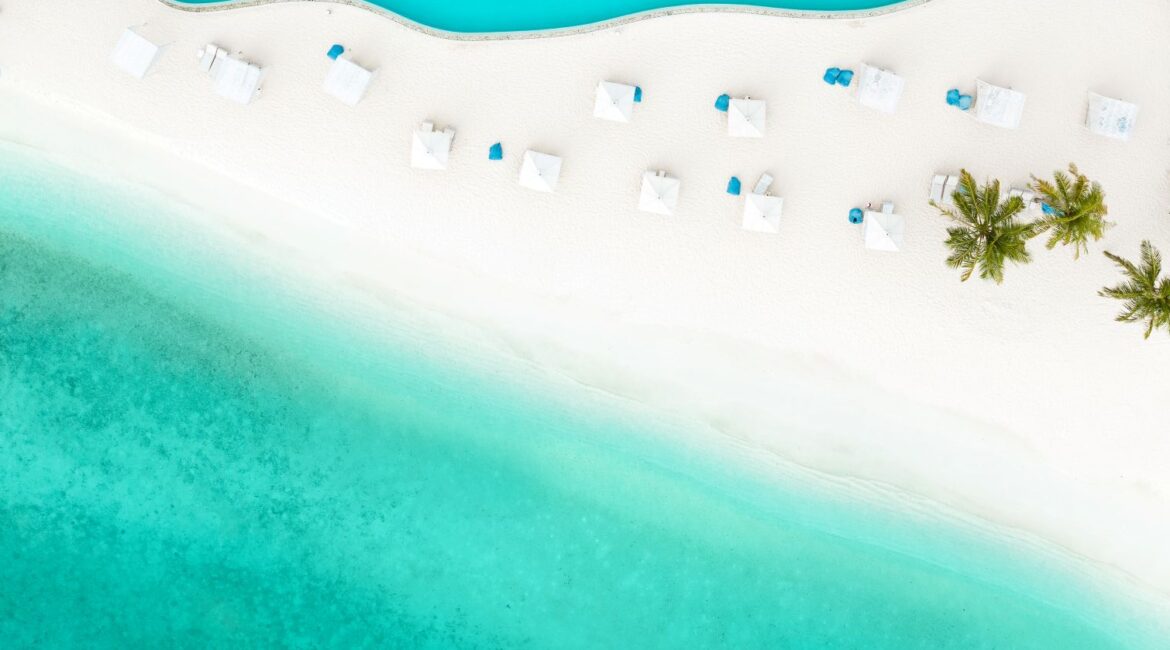 Tropical aerial view of villas at Amilla Maldives Resort
