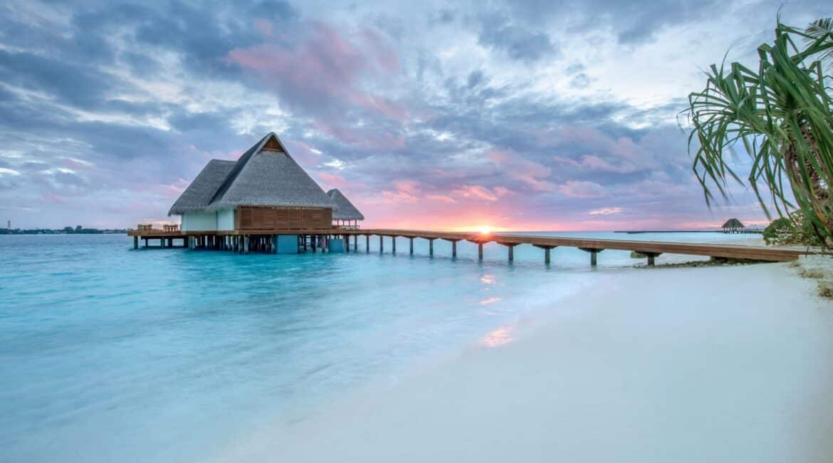 Heritance Aarah Hotel Maldives stunning sunset views over the beach and dusty pink skies