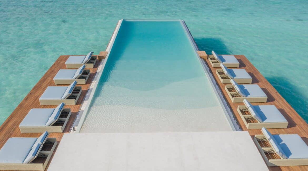 Heritance Aarah Hotel Maldives lengthy infinity pool hovering over the Indian Ocean