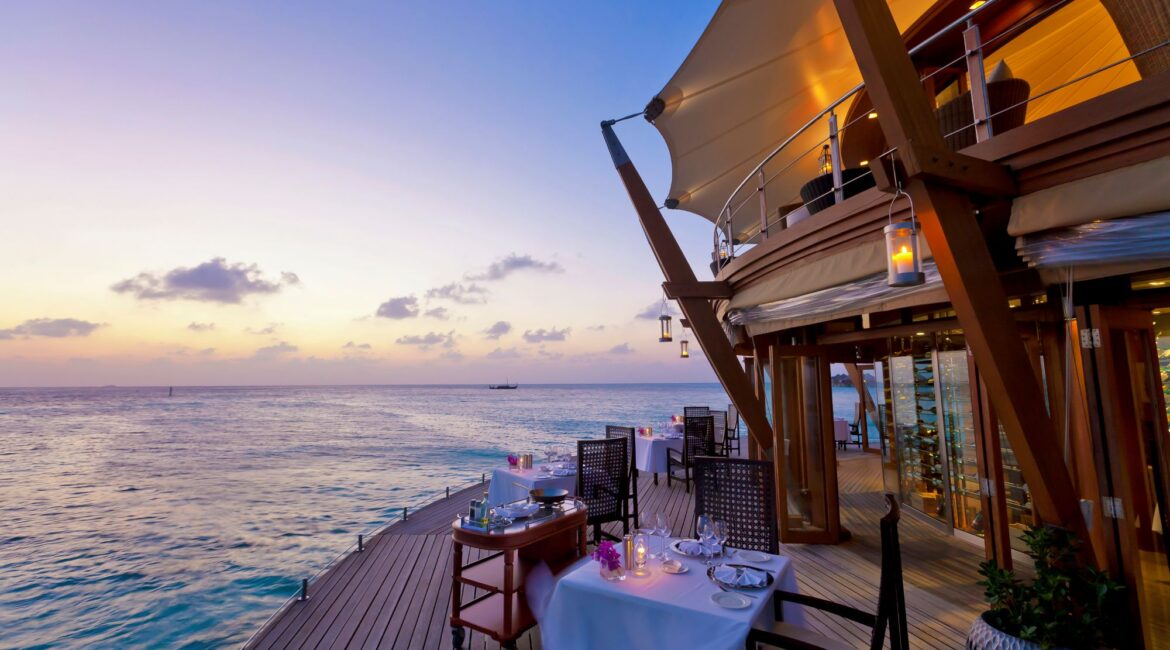 Baros Maldives dining as night falls against a wonderfully dusty sky