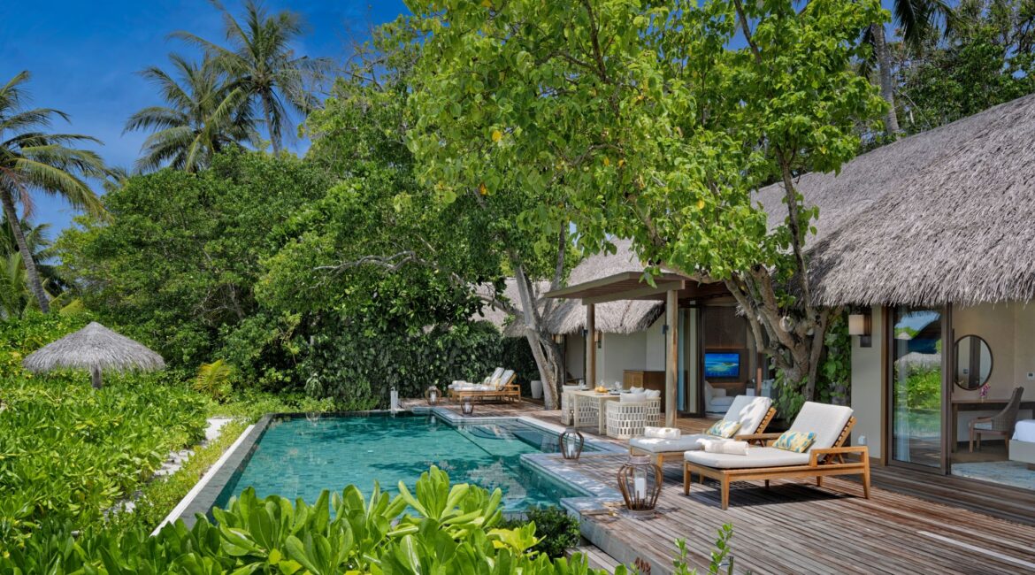 Baros 2 bedroom retreat with private pool framed by jungle palms a tropical paradise for four The Maldives