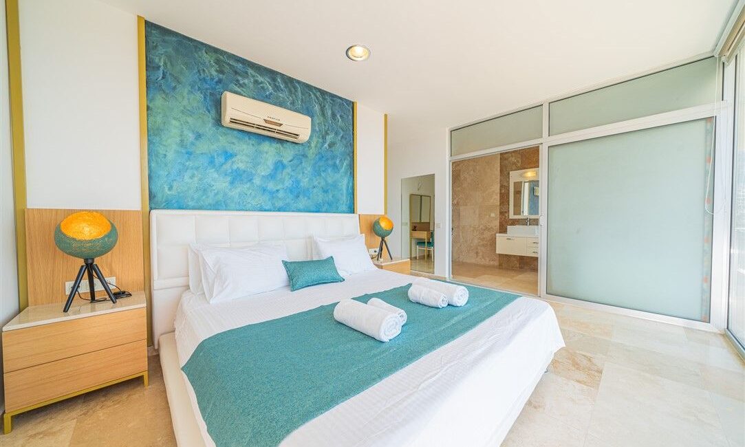 Villa Kayra in Kalkan double bedroom with flashes of turquoise