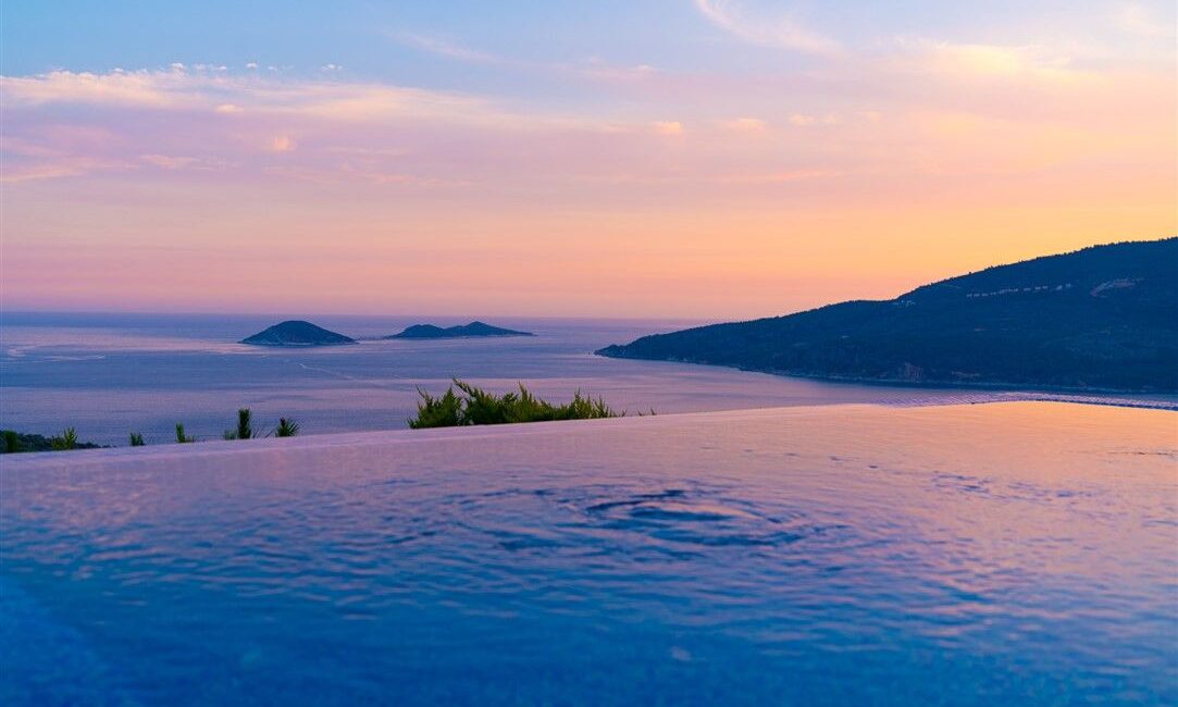 Villa Kayra in Kalkan stunning infinity pool at sunset