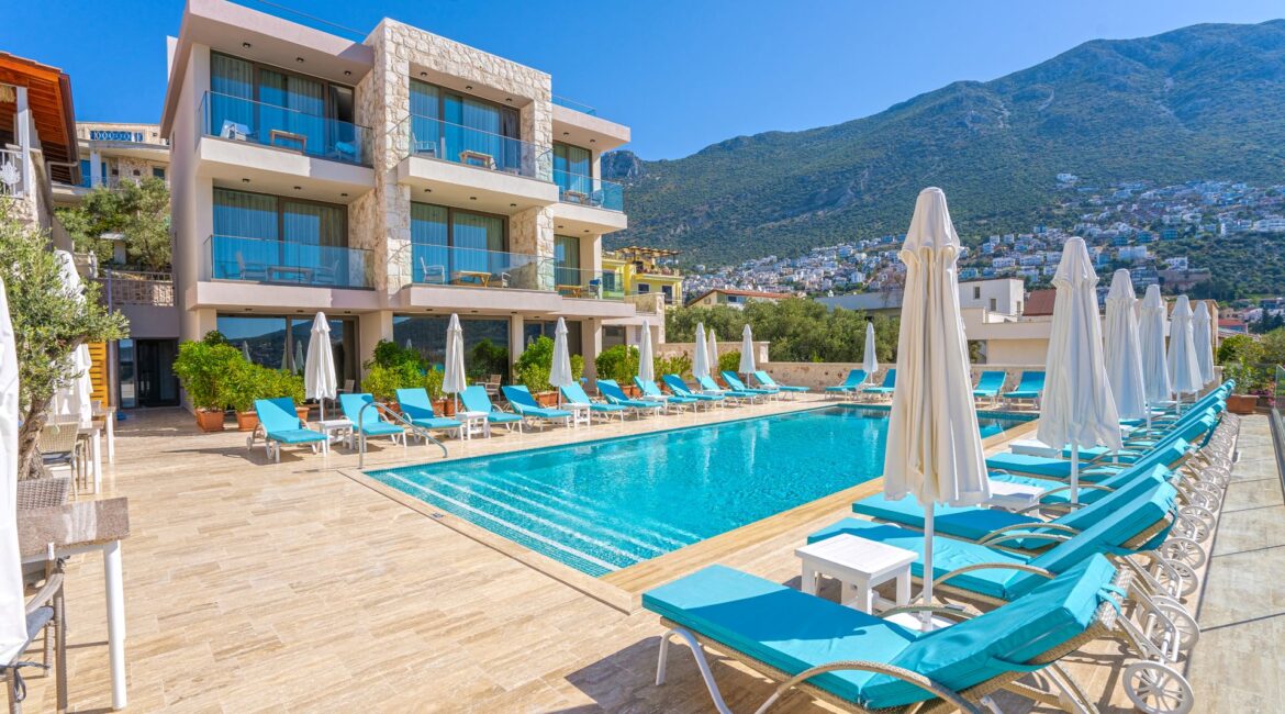 Oasis Hotel Kalkan fourth building swimming pool and day beds surrounding the pool