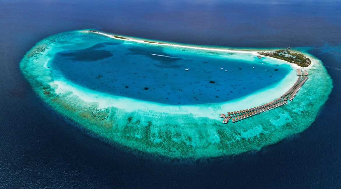 Finolhu Maldives Luxury Resort Aerial Shot Of The Water Villas Reef-ringed Lagoon