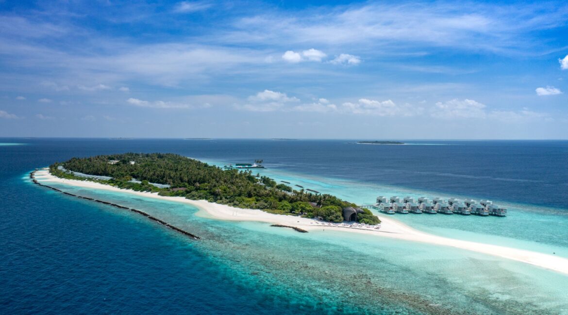 Dhigali Maldives from above, framed by turquoise shallows