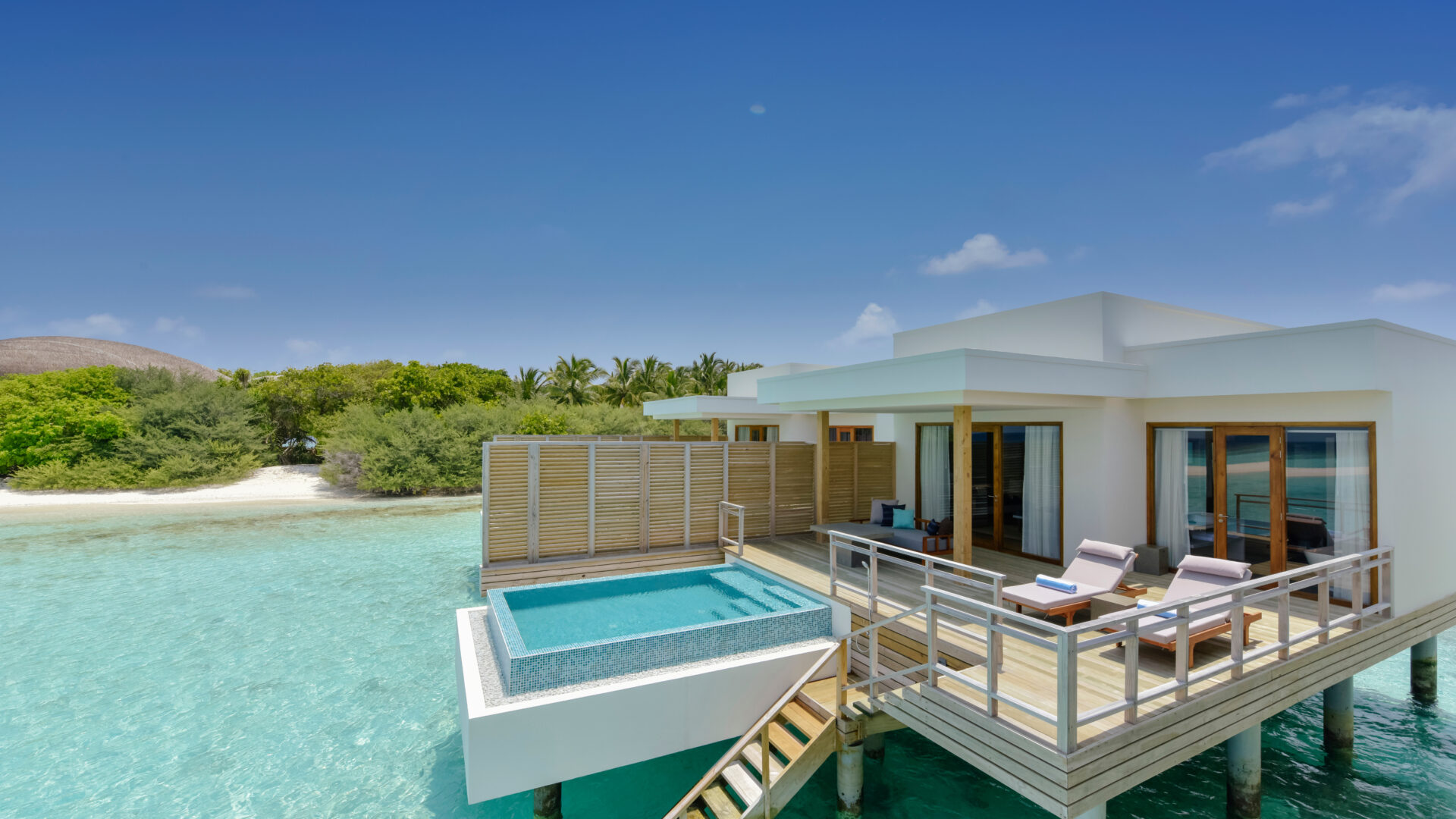 Dhigali Maldives Lagoon Villa With Pool floating over the Indian Ocean
