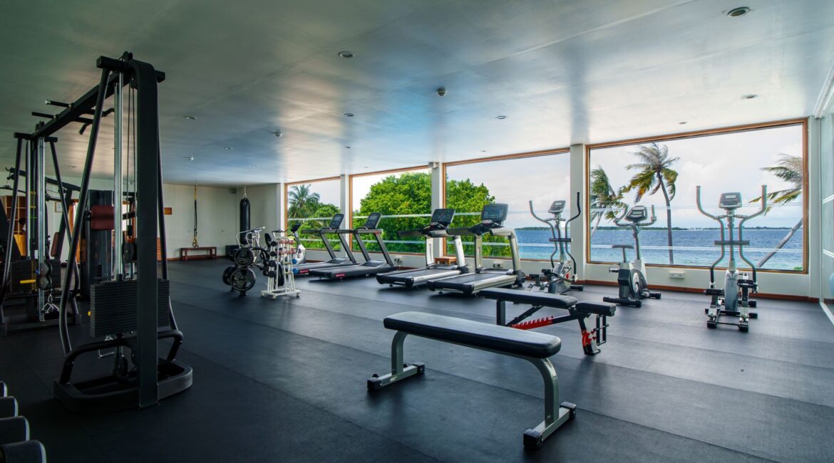 Reethi Faru Resort the gym overlooking the beach in the Maldives