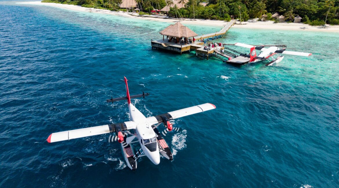 Reethi Faru Resort seaplane departing in the Maldives