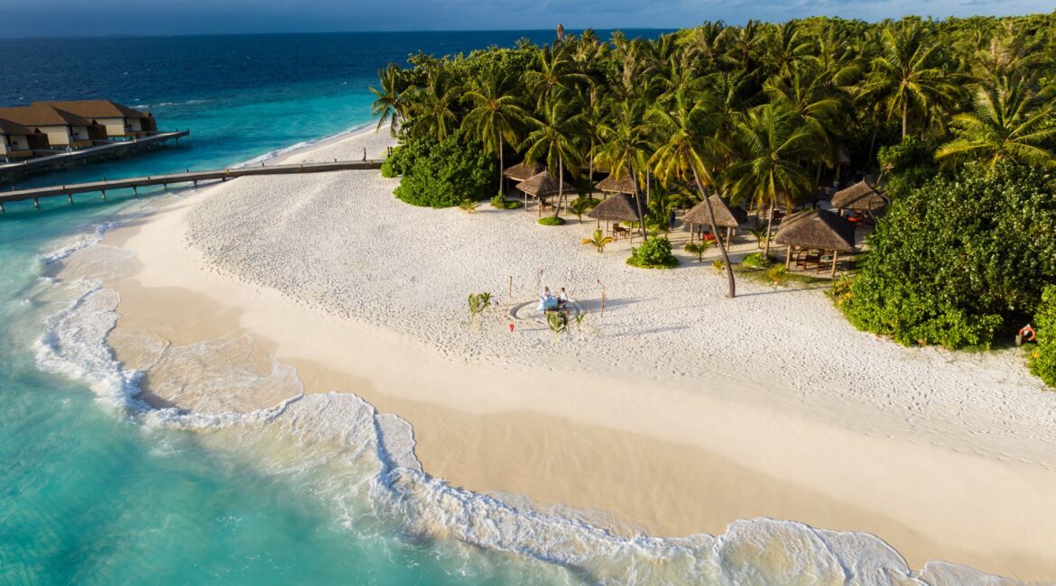 Reethi Faru Resort romantic beach dining Maldives
