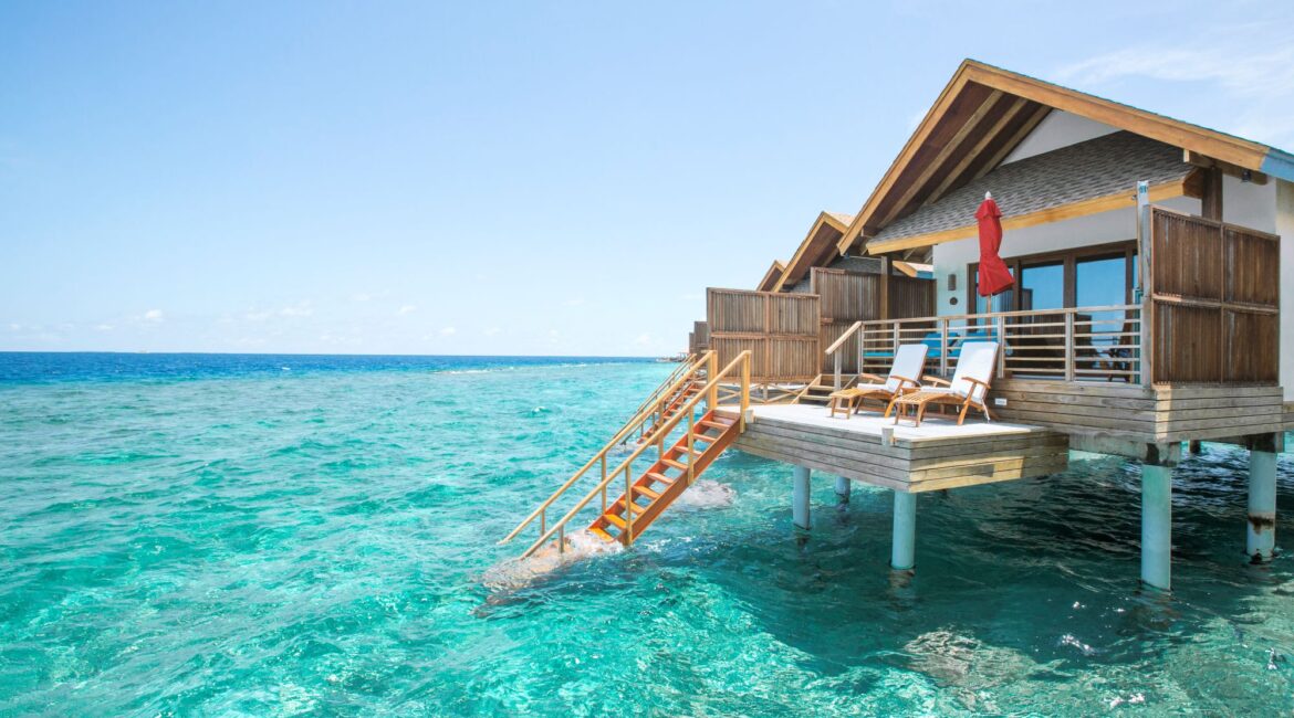 Water Villa private decks with ladders into the sea Reethi Faru Maldives