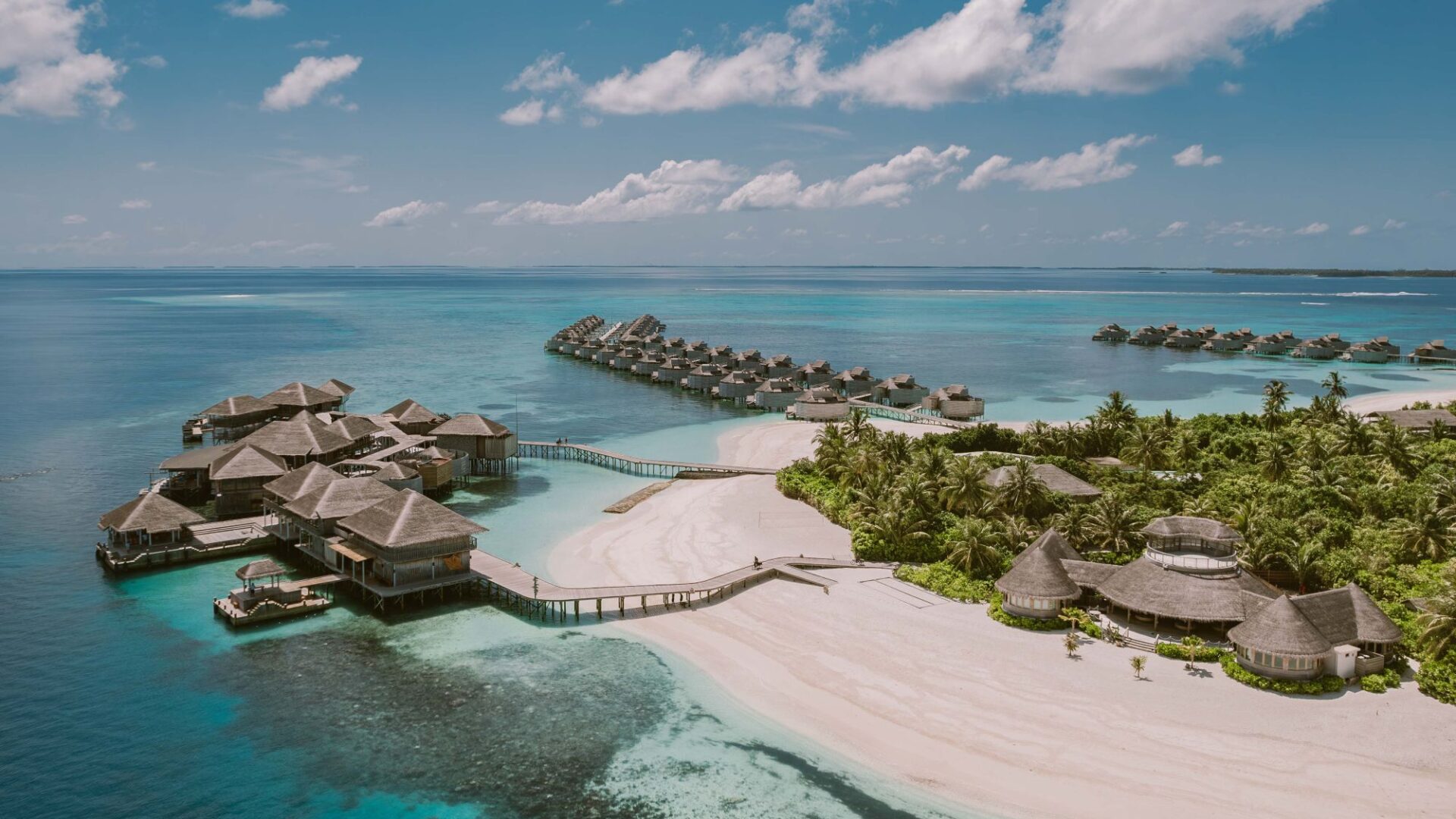 Overwater Villas at Six Senses Laamu Blending Seamlessly with the Lagoon
