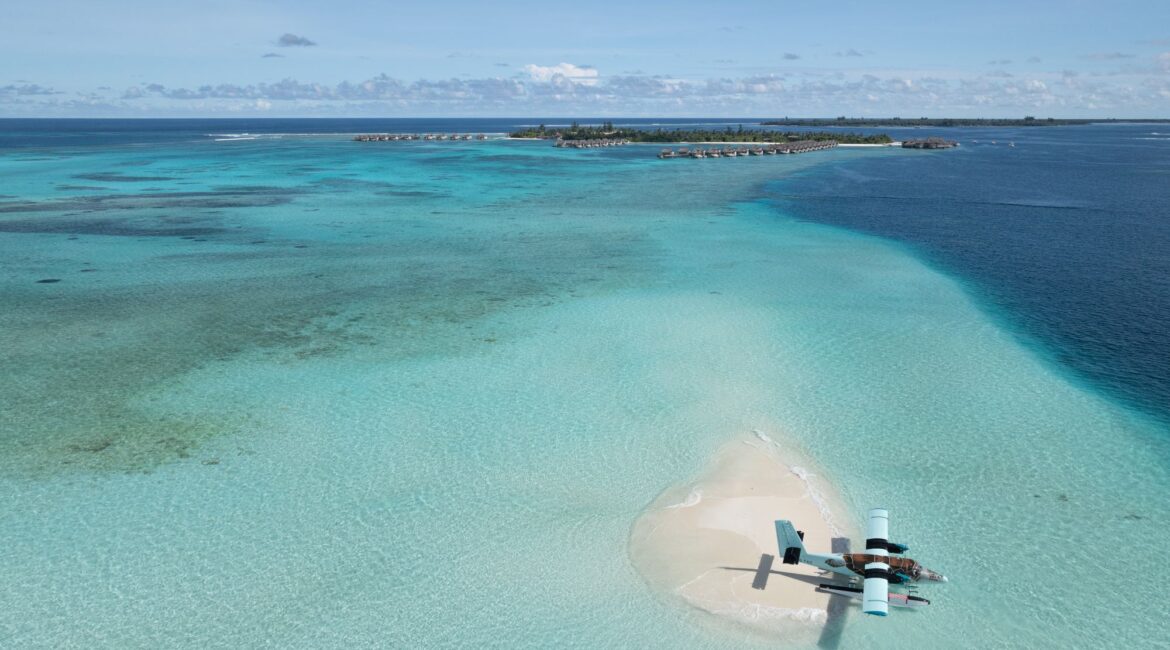 The Flying Turtle - Six Senses Laamu in the background and bright blue seas