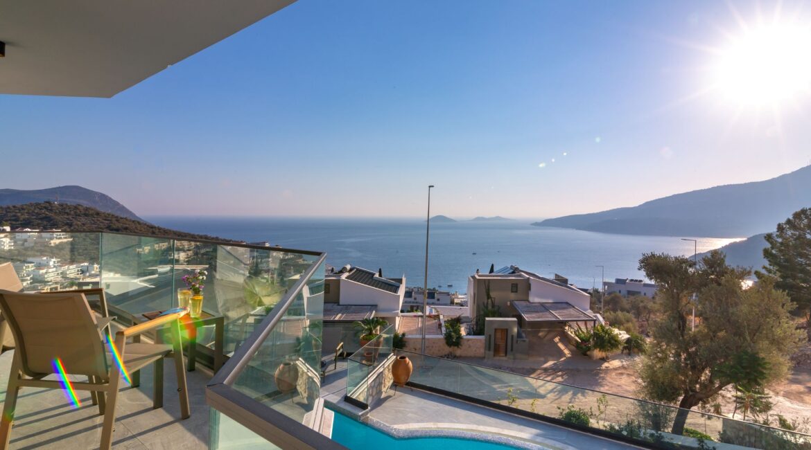 Widescreen sea views from a furnished bedroom balcony at the Olive House Kalkan