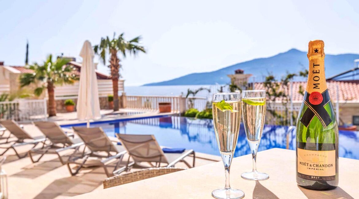 Private pool terrace at Villa Bahce Kalkan with sun loungers and sea views