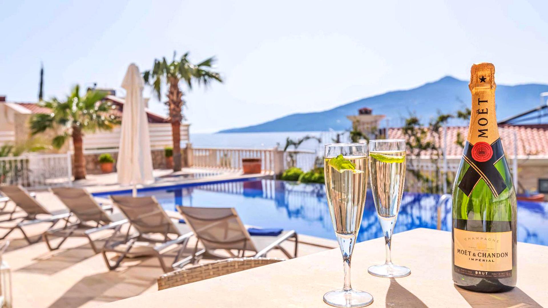Private pool terrace at Villa Bahce Kalkan with sun loungers and sea views
