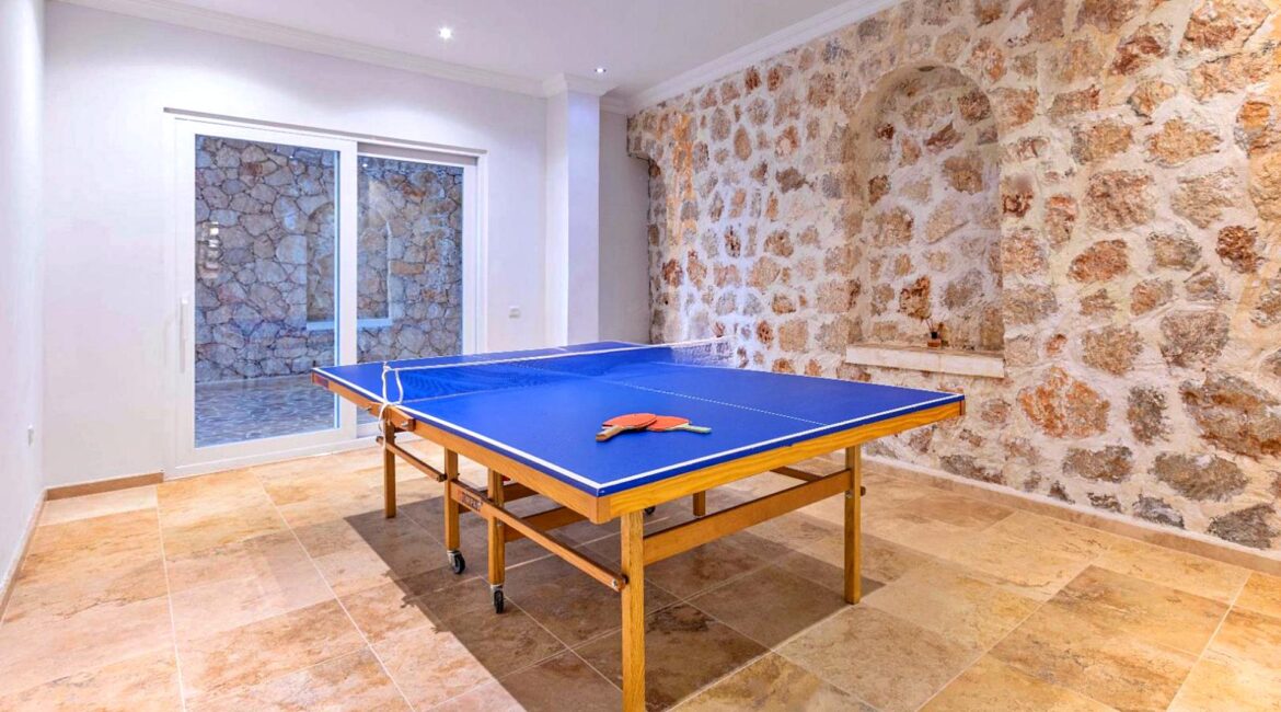 Table tennis room at Villa Bahce Kalkan recreation area.