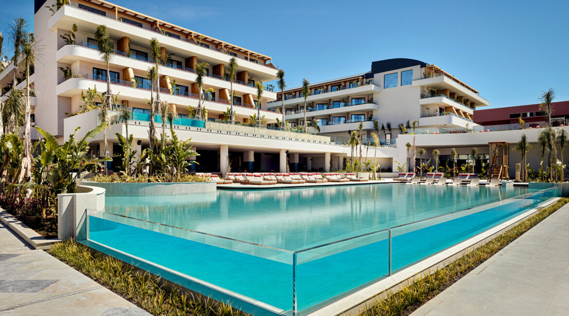 XO Cape Arnna swimming pool and hotel rooms exterior