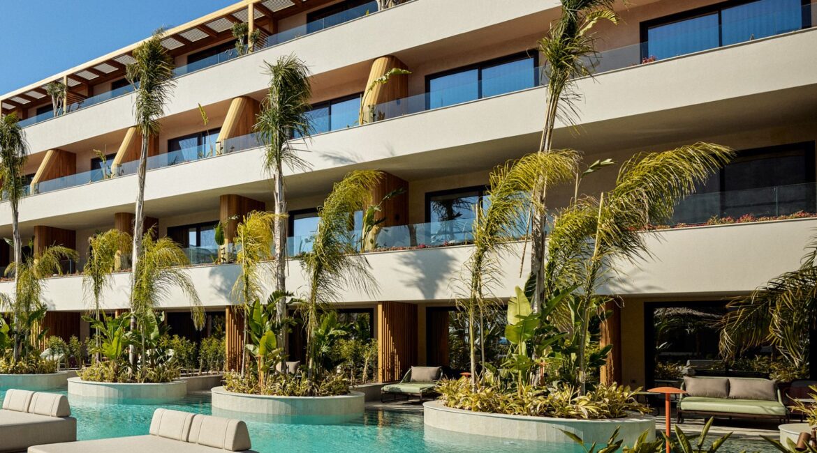 Exterior of the rooms and comfortable sitting areas at XO Cape Arnna